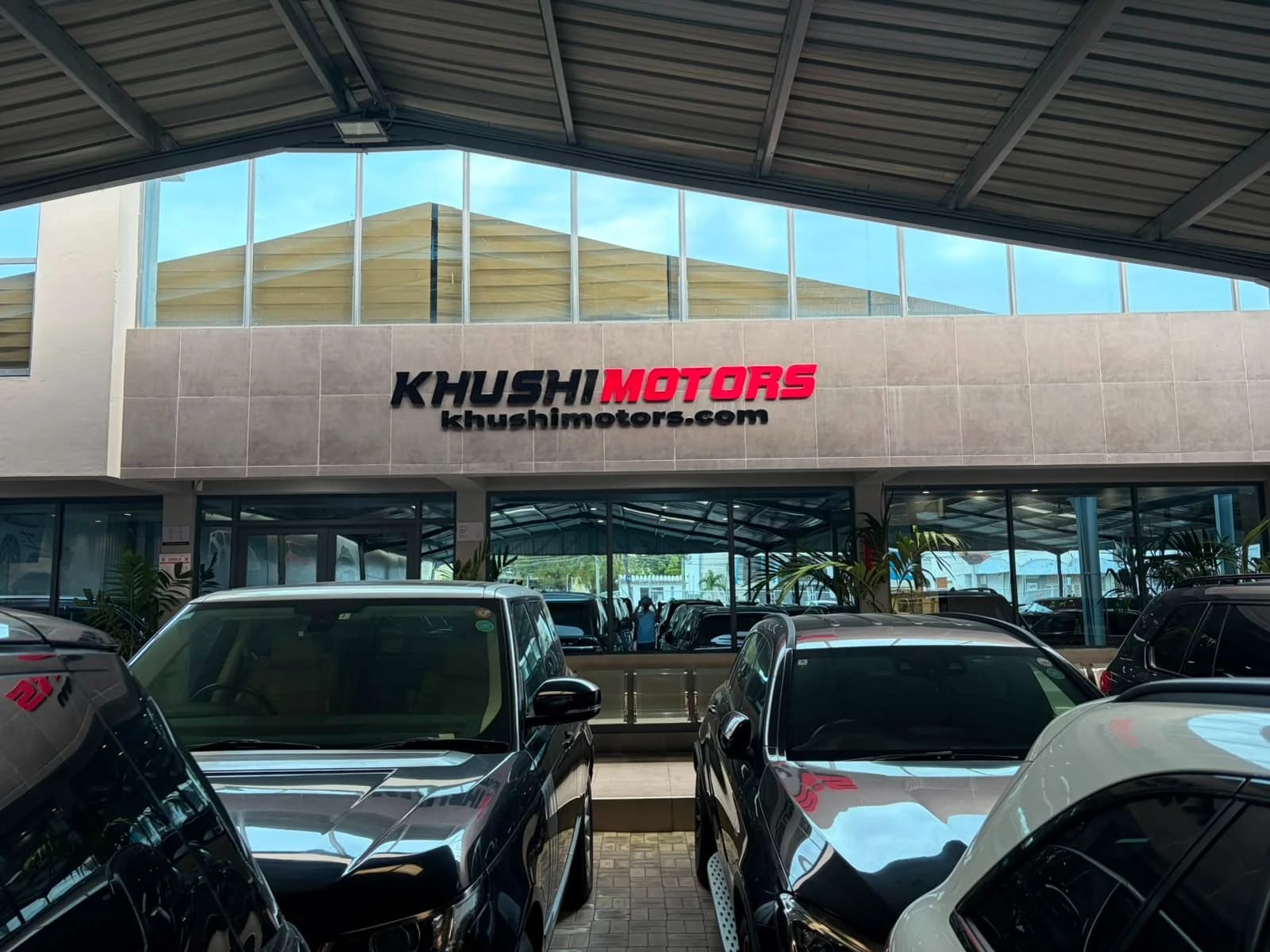 Khushi Motors Kenya team and Mombasa showroom atmosphere for car buyers