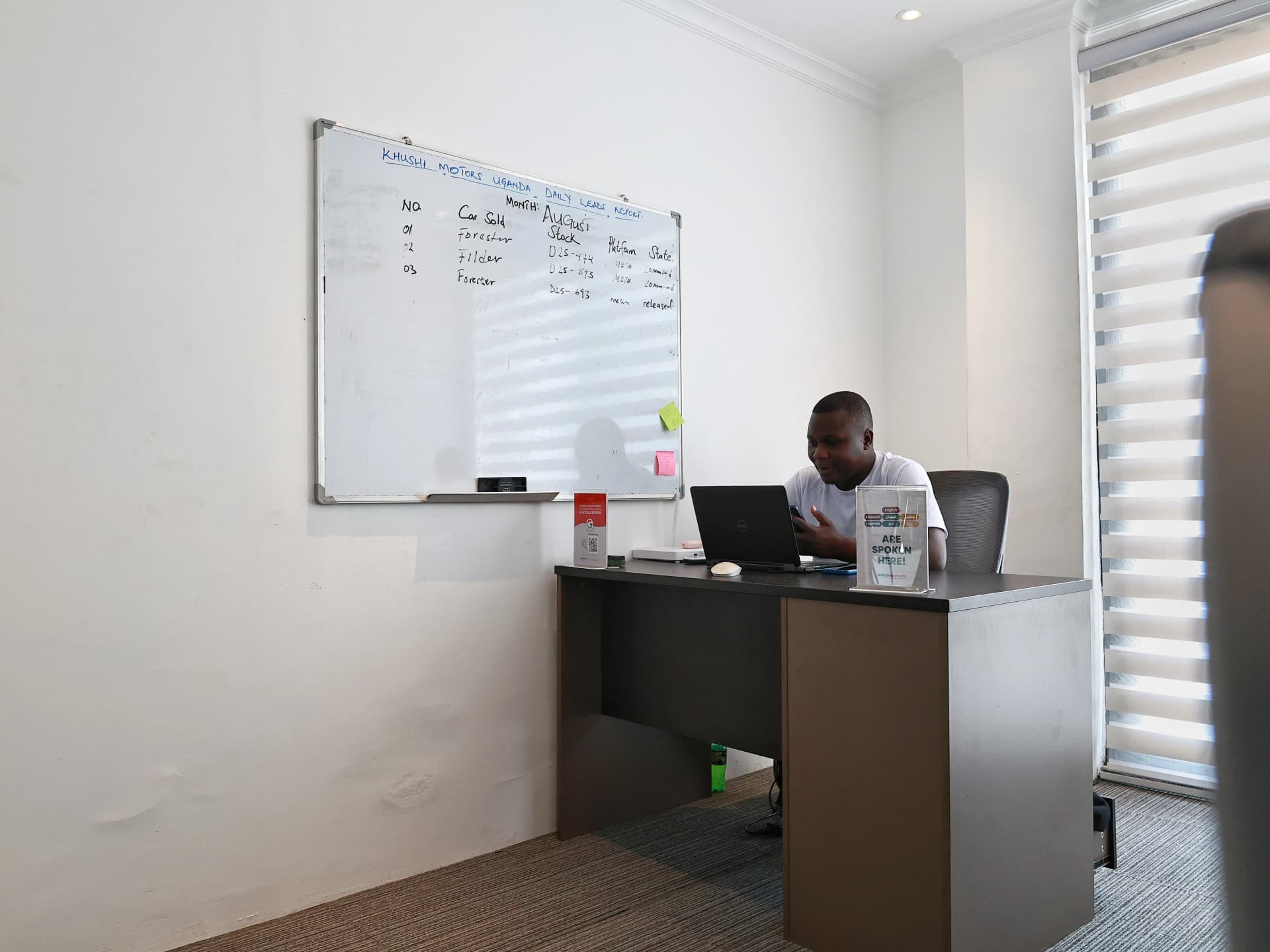 Verified used cars for sale inside the Khushi Motors Uganda showroom in Kampala