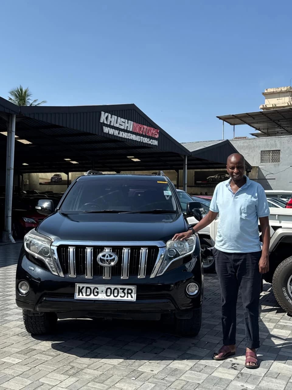 Real vehicle delivery at Khushi Motors Kenya showroom