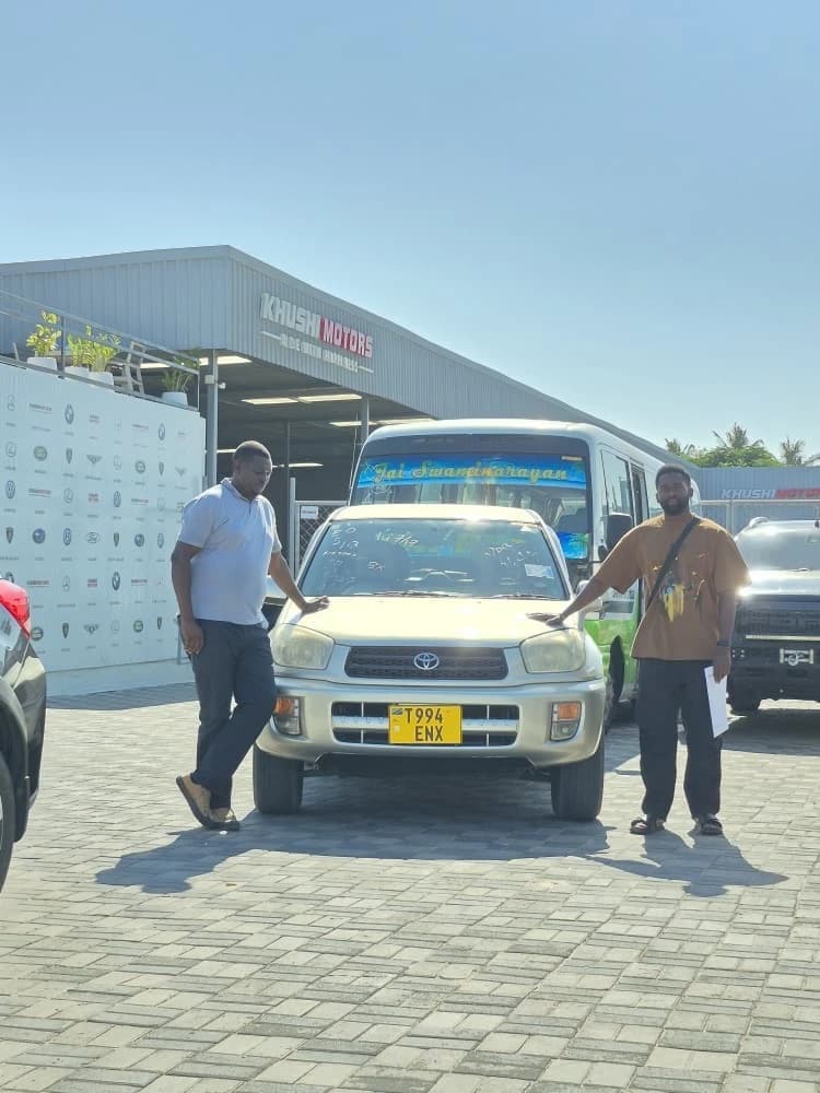 Khushi Motors happy customer collecting car in Dar es Salaam Tanzania